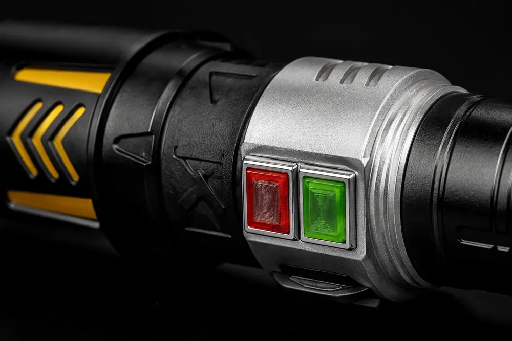 Close-up of KyberSpark X two rectangular red and green controls on the alloy body