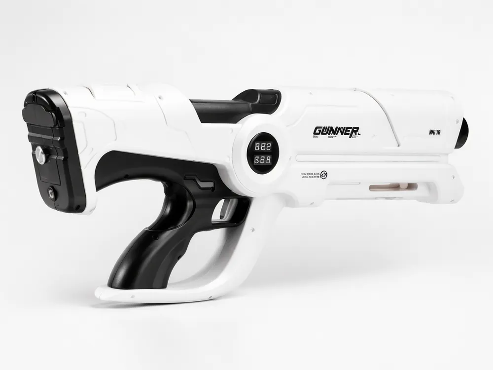 Beam Cannon MK-V genuine unit showing white body, black trigger grip, and protective hand frame